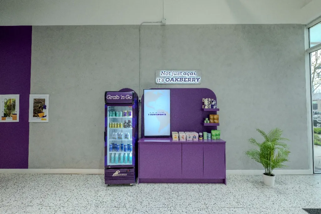 Purple grab-and-go display with a refrigerated drinks cabinet — OAKBERRY AÇAÍ — SURREY, BC